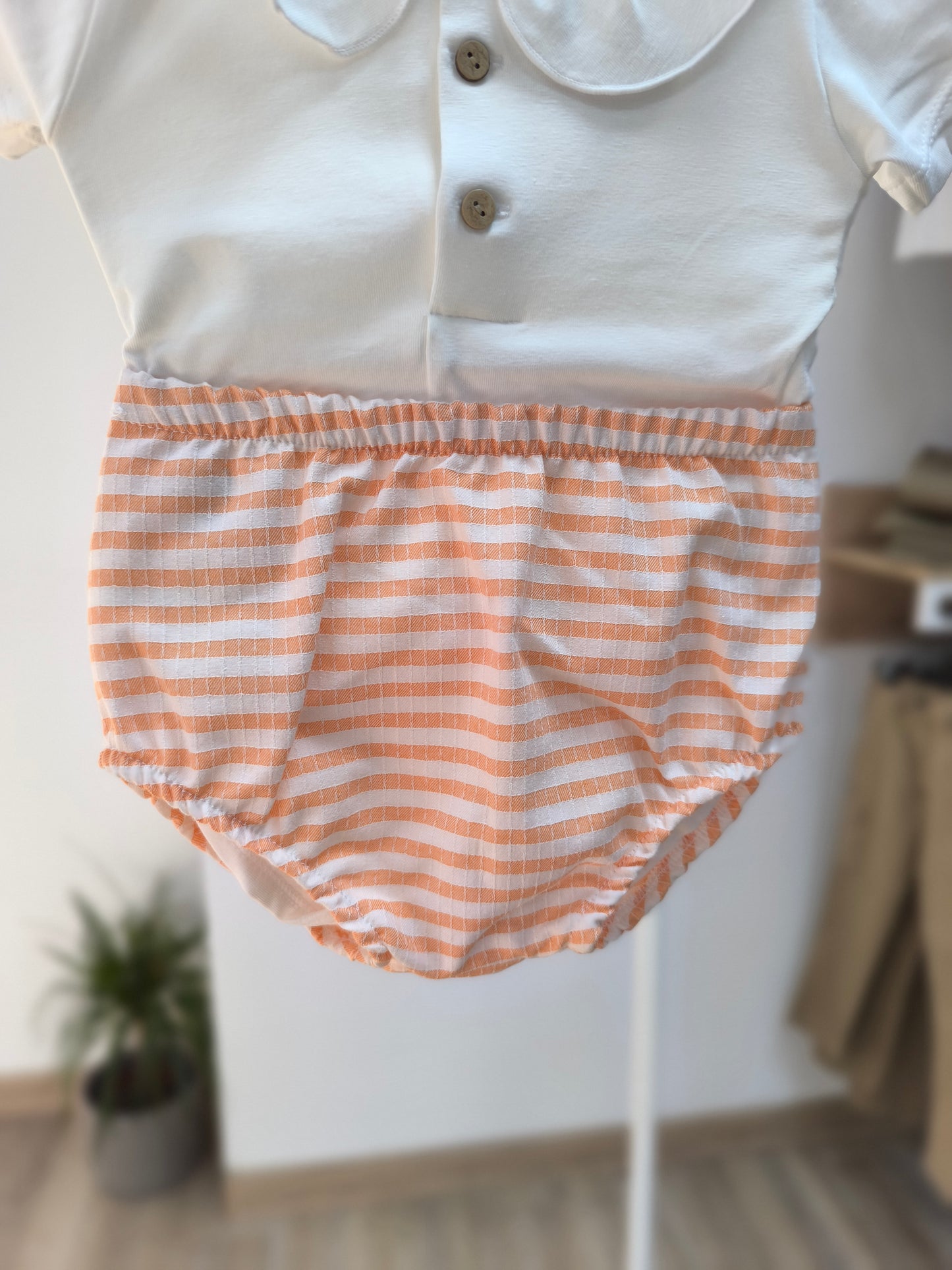 🍊 Pololo Delhi en color mandarina - cubrepañal para bebé de Calamaro