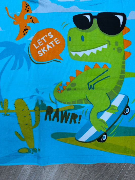 Toalla poncho con gorro para niño – Dinosaurio skater azul | Ligera, divertida y de secado rápido (60x120 cm)
