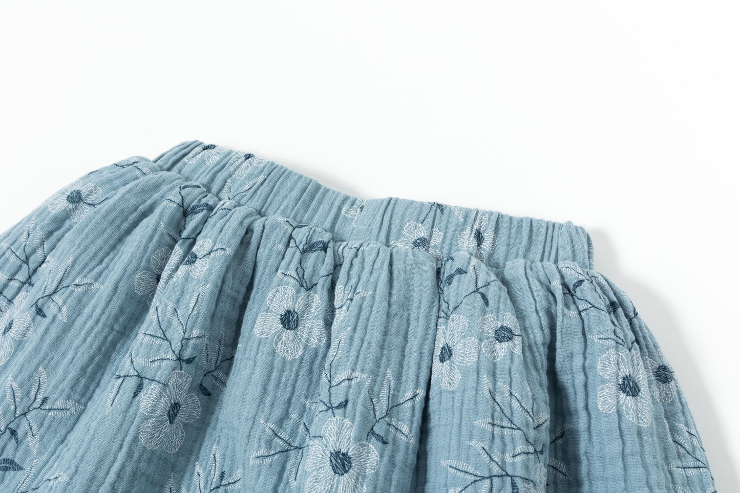 Falda de niña | Tejido bambula con estampado de flores | Color Azul |