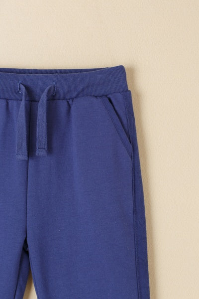 Pantalón básico infantil | Tejido afelpado | Cintura elástica con cordón |Color Azul