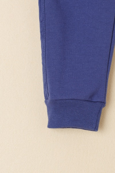 Pantalón básico infantil | Tejido afelpado | Cintura elástica con cordón |Color Azul