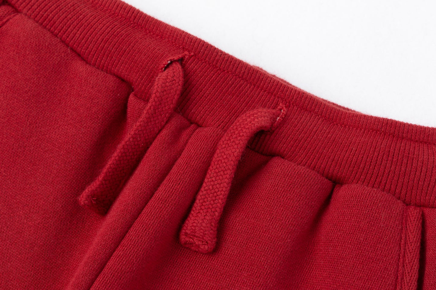 Pantalón básico infantil unisex | Tejido afelpado | Cintura elástica con cordón | Color Rojo