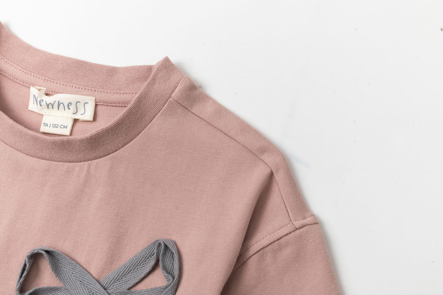 Camiseta rosa maquillaje con lazo | Manga Corta