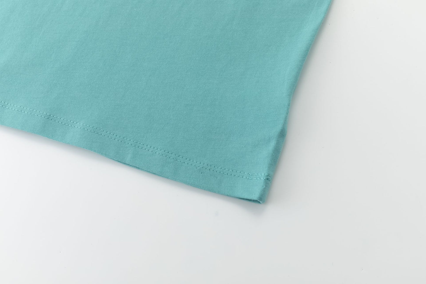 Camiseta de niño azul turquesa “Urban Jungle” | 100% Algodón