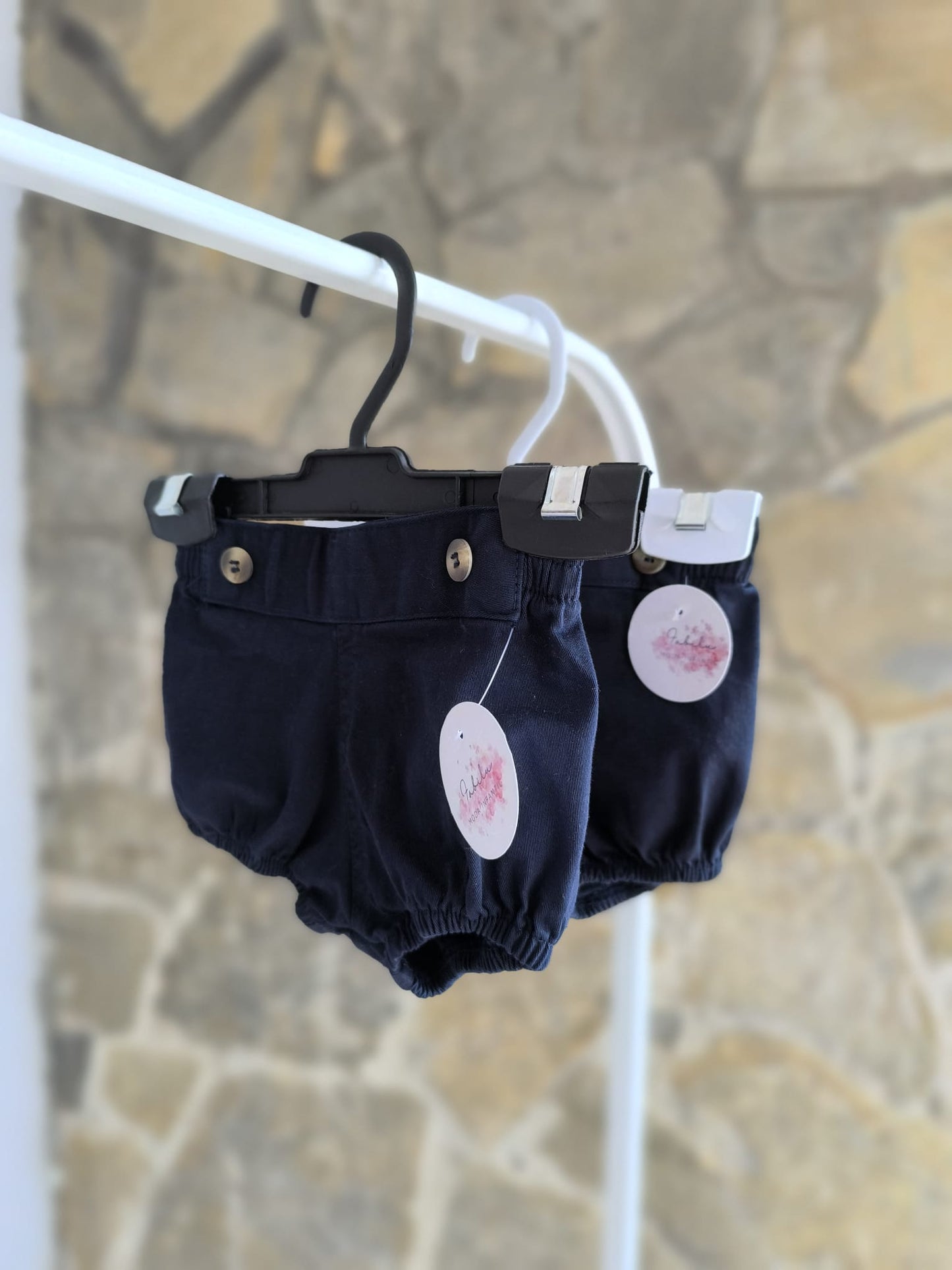 Ranita de bebé azul marino unisex con elástico suave y botones decorati