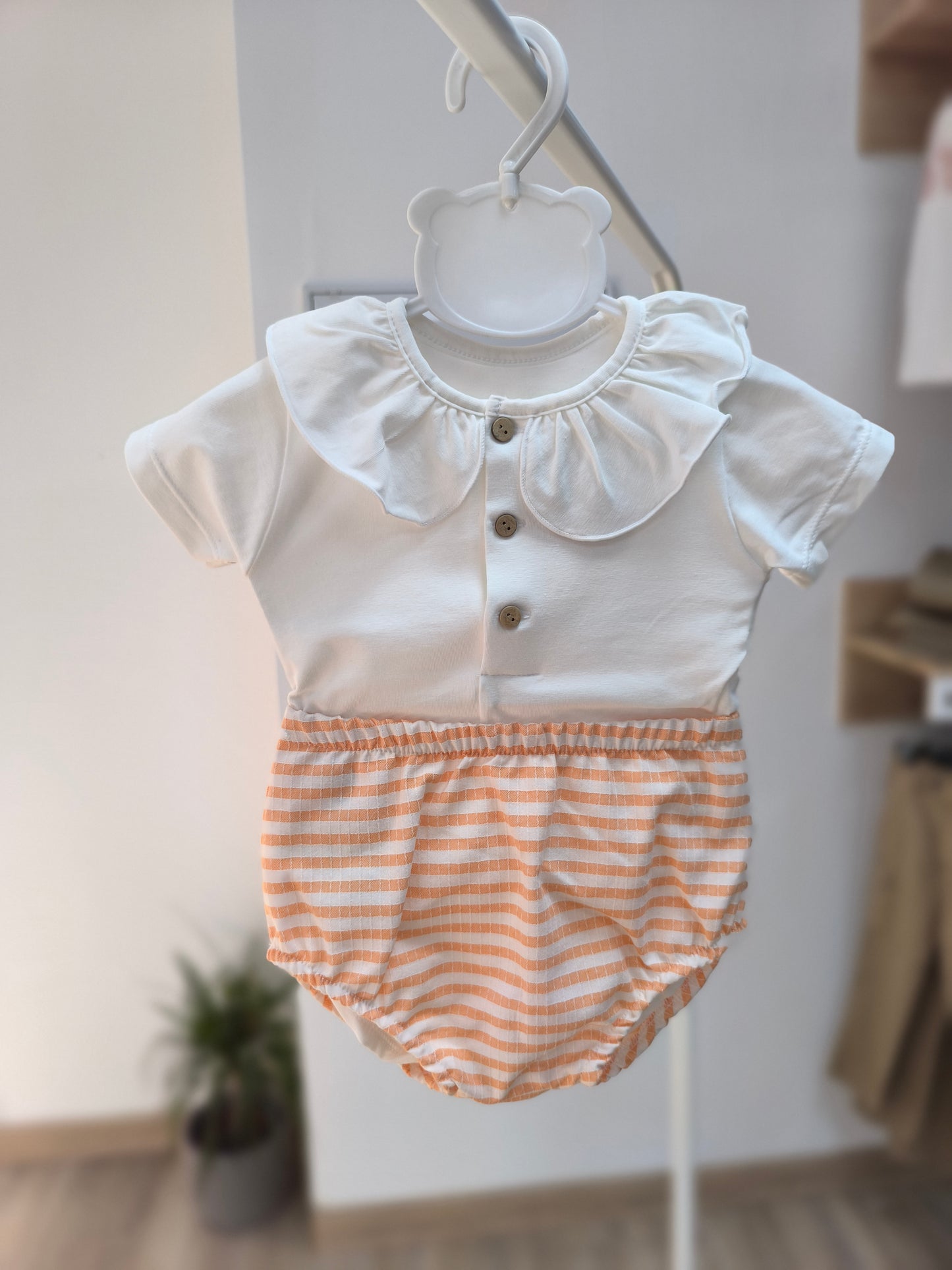 🍊  Pololo Delhi en color mandarina - cubrepañal para bebé de Calamaro