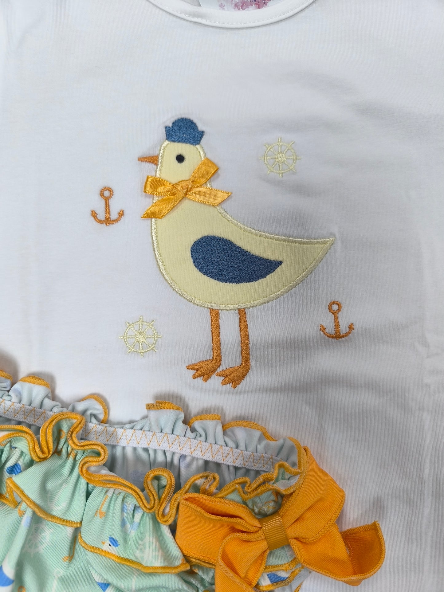 Conjunto de baño para niña con gaviota y culetín verde con lazos