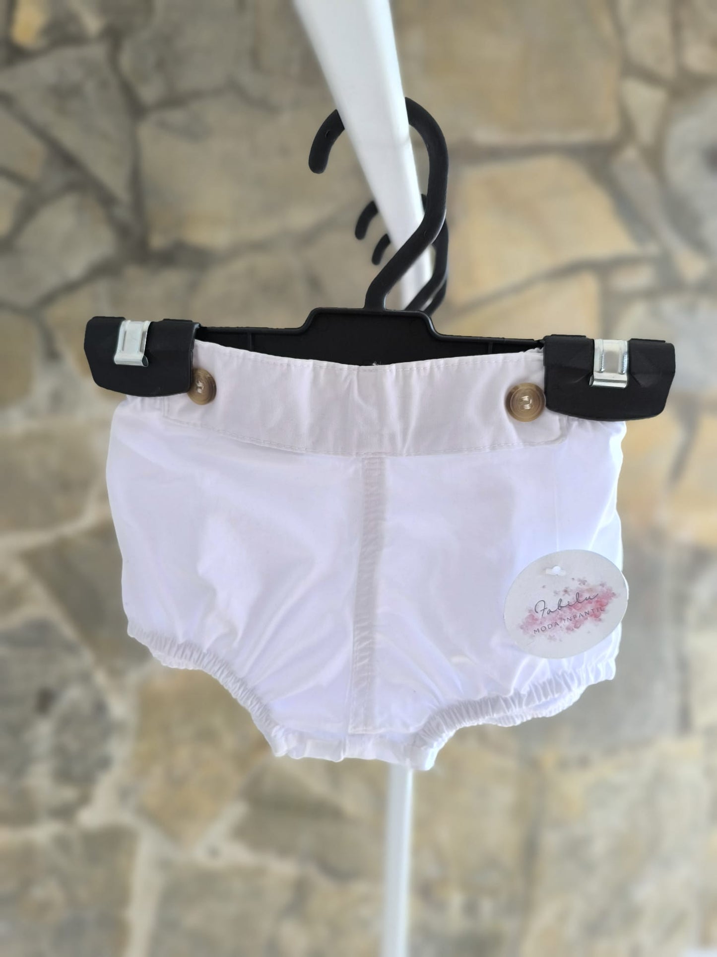 Ranita de bebé blanca unisex con elástico suave y botones decorativos