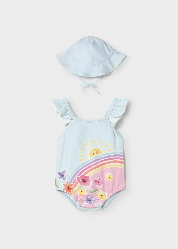 Bañador de bebé con gorro y protección solar UPF | estampado floral en color celeste 🌈☀️