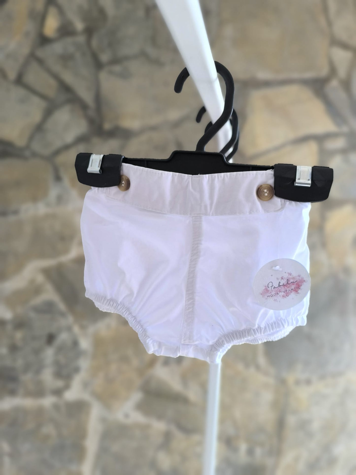 Ranita de bebé blanca unisex con elástico suave y botones decorativos