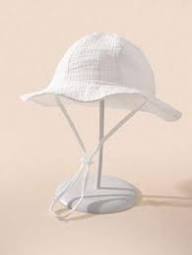 Gorro de bebé de muselina blanco – suave, transpirable y perfecto para el verano
