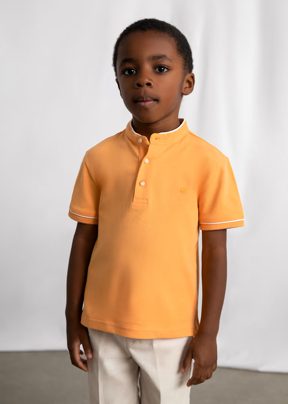 Polo cuello mao niño color naranja